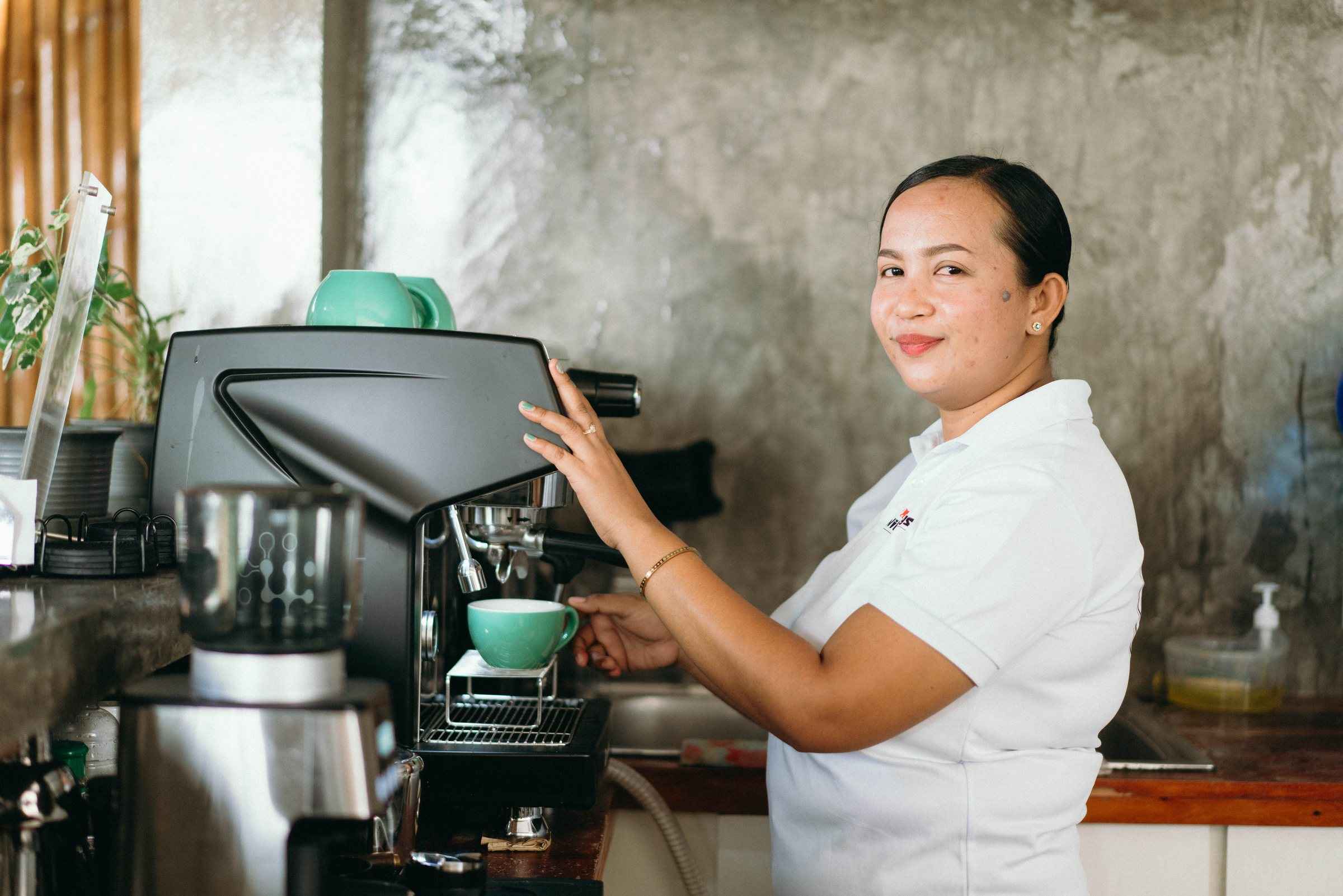 Barista at the espresso machine